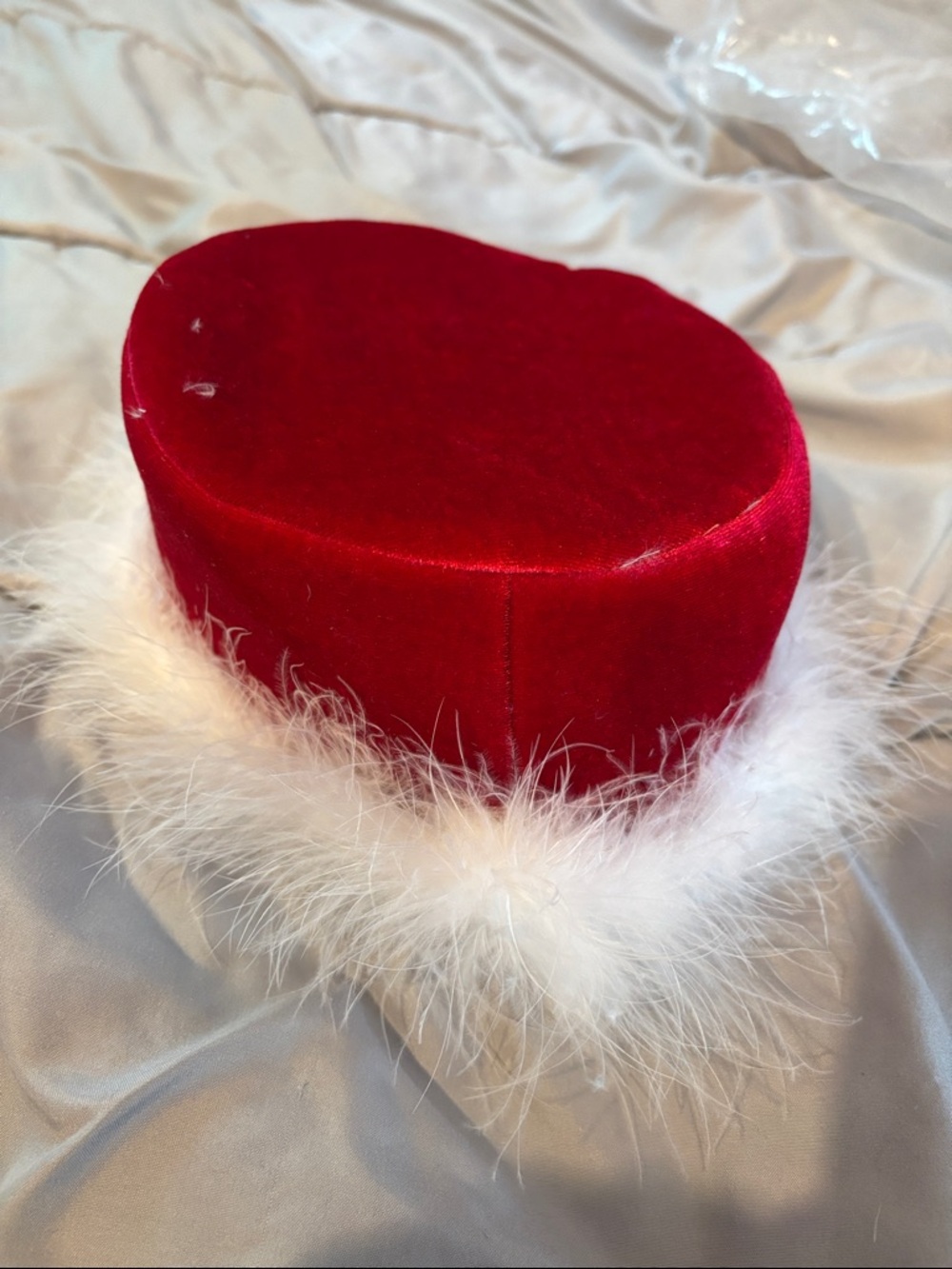 Red Velvet Santa-Style Hat with White Feather Trim